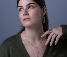 a girl modeling jewllery